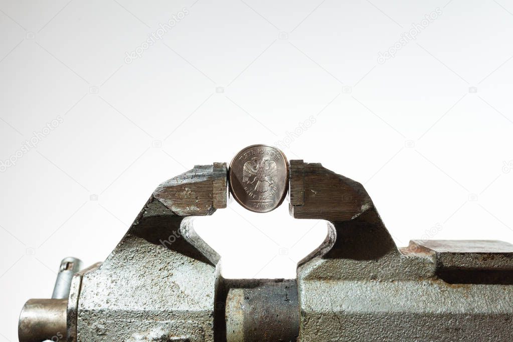 The Russian coin in vise