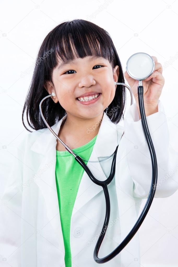 Happy Asian Chinese Little Girl Holding Stethoscope 