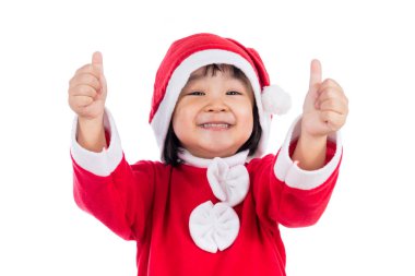 Happy Asian Chinese little santa claus girl with thumbs up clipart