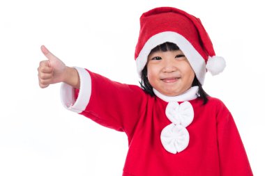Mutlu Asyalı Çinli küçük Noel Baba kız başparmak yukarıya ile