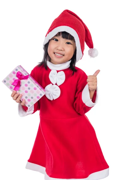 Asiático chino poco santa chica holding regalo con pulgares arriba — Foto de Stock