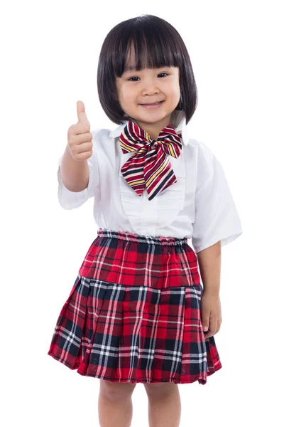 Happy Asian Chinese little student girl showing thumbs up — Stock Photo, Image