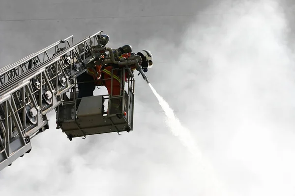 Firemen at work Royalty Free Stock Images