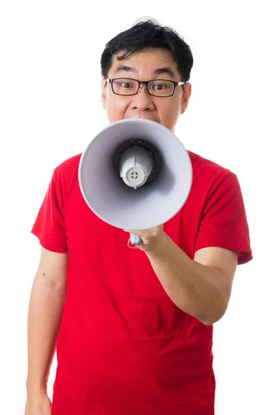 Asian Chinese man wearing red shirt holding loudspeaker — Stock Photo, Image