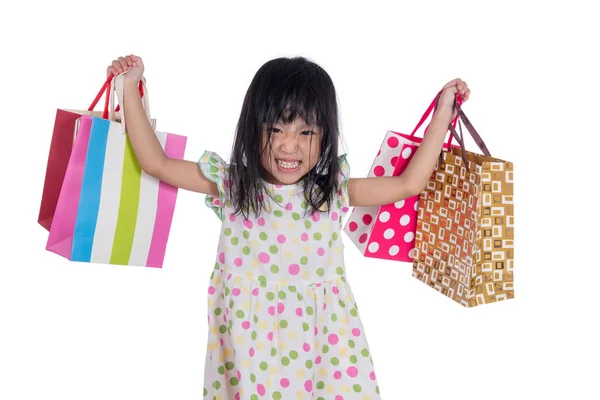 Asian chinese little girl with shopping bags — Stock Photo, Image