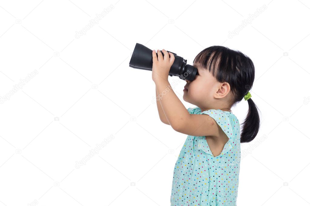 Asian Chinese little girl holding binoculars