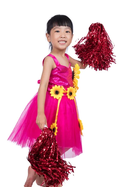 Asiatisk kinesisk cheerleader pige holder en pompon - Stock-foto