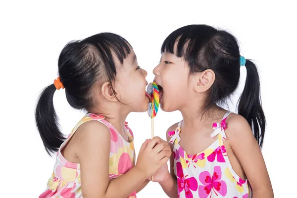 Asiatique petites filles chinoises manger sucette — Photo
