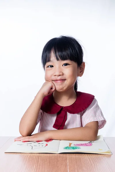 Aziatische Chinees meisje het lezen van een boek schilderij — Stockfoto