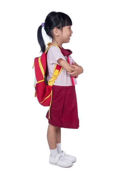 Asiatico piccolo cinese ragazza in scuola uniforme con scuola borsa — Foto Stock