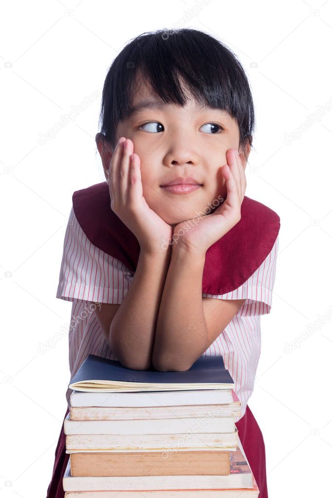 Asian Little Chinese girl with piles of books
