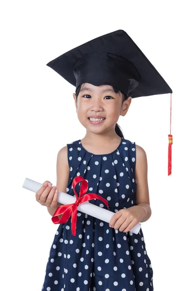 Asian Little Chinese girl wearing graduation cap and holding dip — Stock Photo, Image