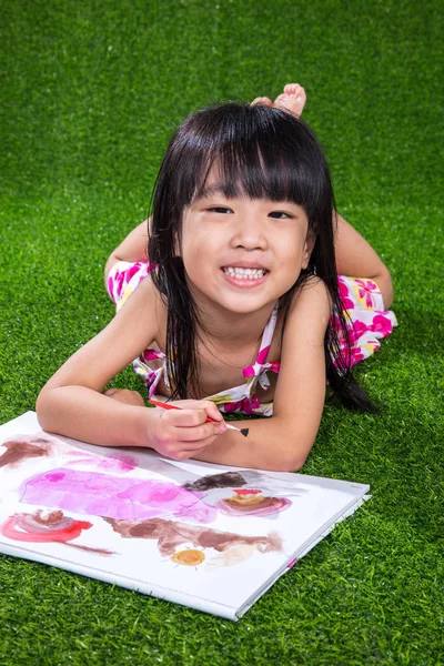 Asian Chinese little girl drawing and painting