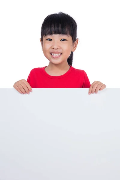 Asian Chinese little girl behind a blank white board — Stock Photo, Image