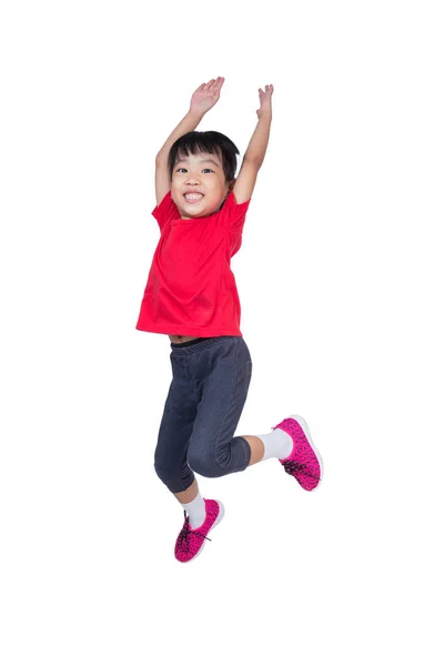 Asian Chinese little girl jumping up and wave her hands — Stock Photo, Image