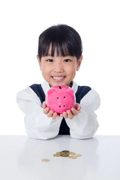 Asiática china niña holding piggy banco — Foto de Stock