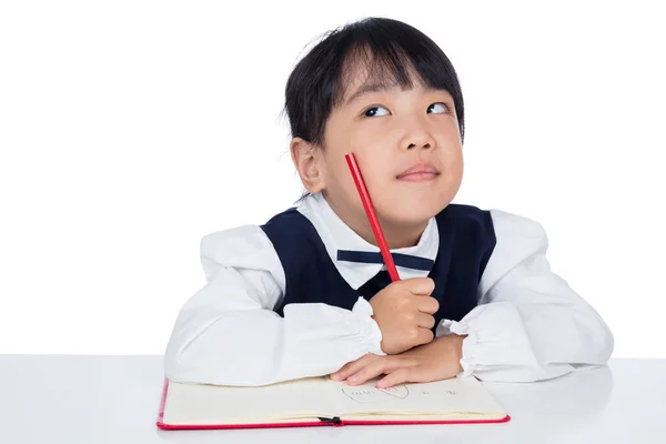 Asiatico piccolo cinese ragazza writing homework — Foto Stock