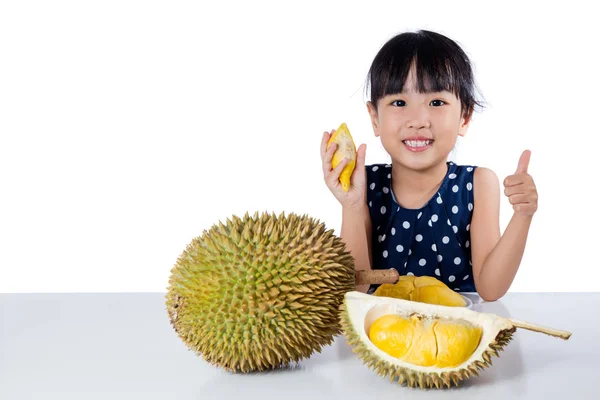 Asyalı Çinli küçük kız Durian meyve yeme