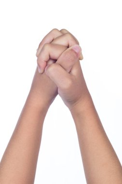 Çocuğun elleri birlikte dua katlanmış