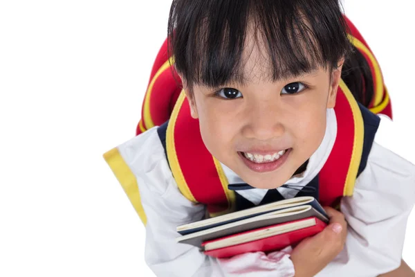 Asiático chinês escola primária menina sentado no chão — Fotografia de Stock