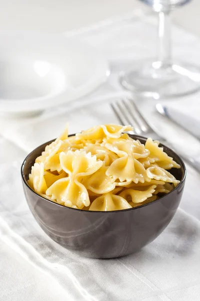 Farfalle pasta in a bowl — Stock Photo, Image