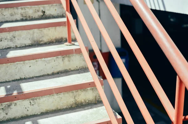 Abstract emergency stairs access for people, gray textured color empty stairway indoors grungy structure background