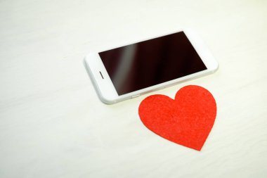 Kalp simgesi ve cep telefonu, Sevgililer günü arka plan tasarım seviyorum