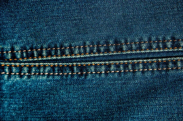 Der Hintergrund von Jeans-Stoff. — Stockfoto