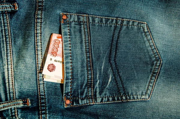 Jeans and money. — Stock Photo, Image