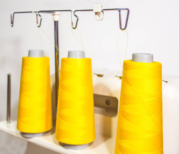 Thread coils installed on the overlock machine