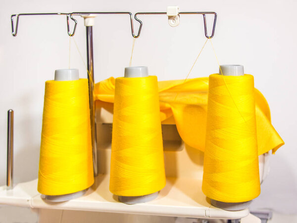 Thread coils installed on the overlock machine