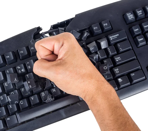 愤怒的用户被击碎的键盘 — 图库照片