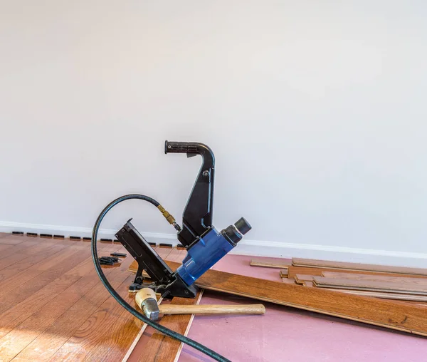 Hardwood floor installation — Stock Photo, Image