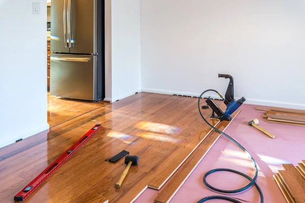 Hardwood floor installation — Stock Photo, Image