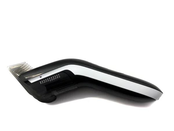在白色背景下剪头发用的理发机 一个美容院的电机 男性理发工具 — 图库照片
