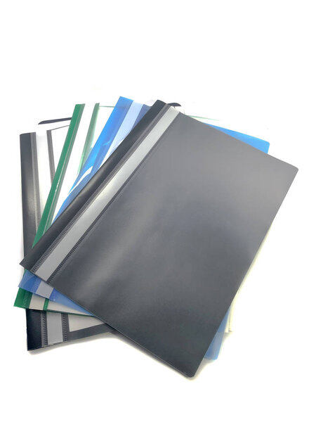 Office folders for papers isolated on white background. A set of folders for office work. Multi-colored folders with documents. Office work.