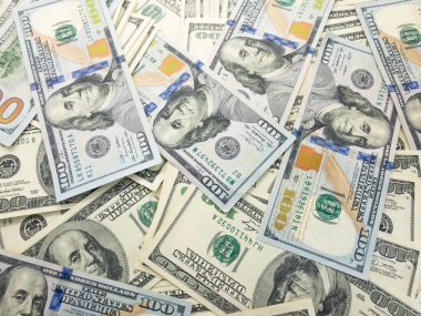 Dolar arkaplanı. Kağıt paranın geçmişi. Amerikan doları. İş ve finans.