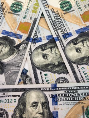 Dolar arkaplanı. Kağıt paranın geçmişi. Amerikan doları. İş ve finans.