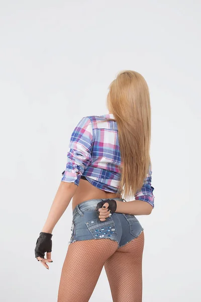 Beautiful female ass in denim shorts — Stock Photo, Image