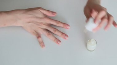 Woman painting her nails