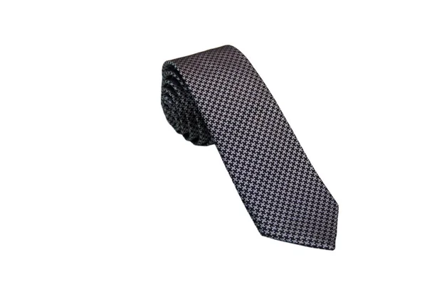 Крупный план элегантного стильного галстука, свернутого и изолированного на белом фоне — стоковое фото