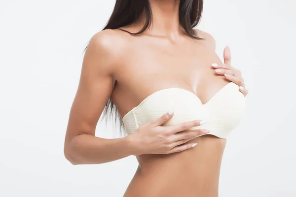 Girl with gorgeous Breasts on a white background. — Stock Photo, Image