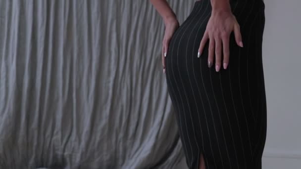 Young beautiful girl in lingerie takes off her skirt. Slow motion — Stock Video