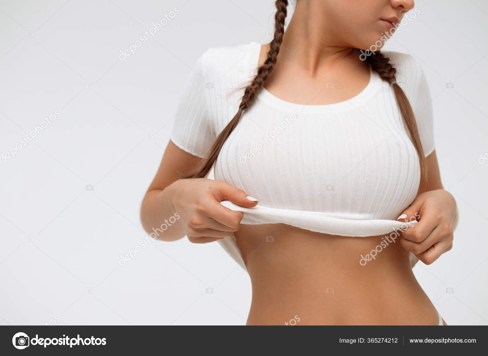 Young Female Body With Small Breasts In White Shirt Stock Photo
