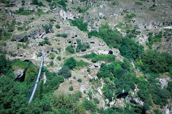 Ancient cave settlement between the mountains in Armenia — Stock Photo, Image