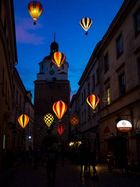 Mountebanks Carnaval in the old town Lublin clipart