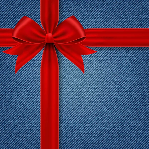Tarjeta con lazo de regalo rojo y cinta sobre fondo denim . — Vector de stock