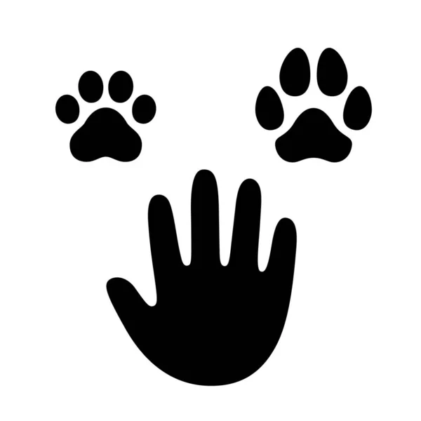 Человеческая рука с лапой собаки и кошки — стоковый вектор