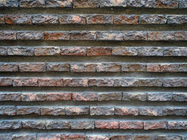 Doku arka plan kırmızı eski yıpranmış tuğla duvar. 