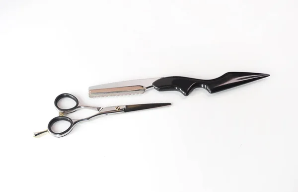 Hairdressing scissors and blade isolated — Stock Photo, Image